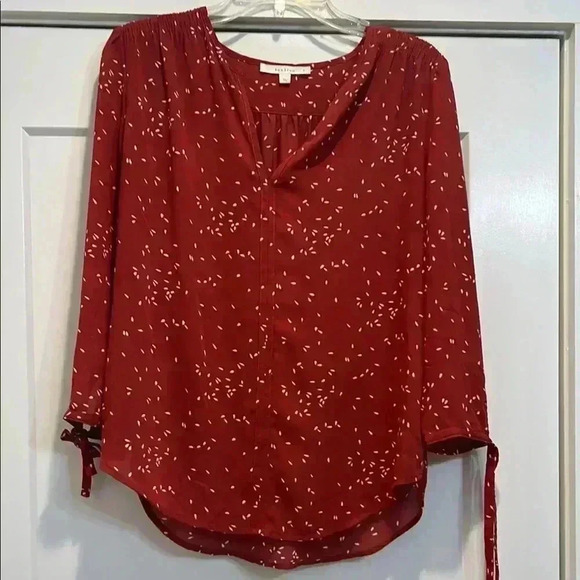 Fun2fun rust colored shirt with a cream colored design size small. - Picture 6 of 11